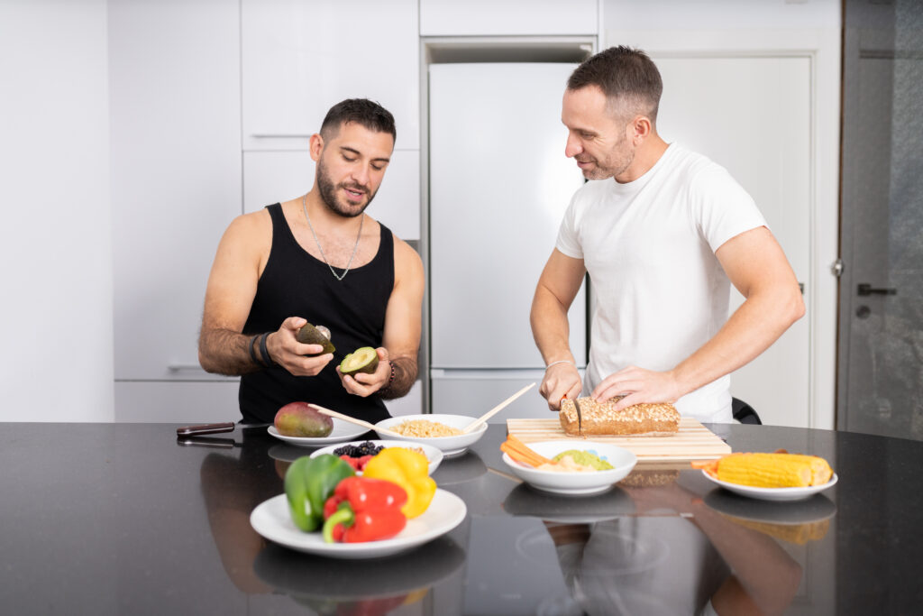 gay couple cooking healthy vegan food together at 2023 11 27 05 13 54 utc nutrition,exercise,mental health