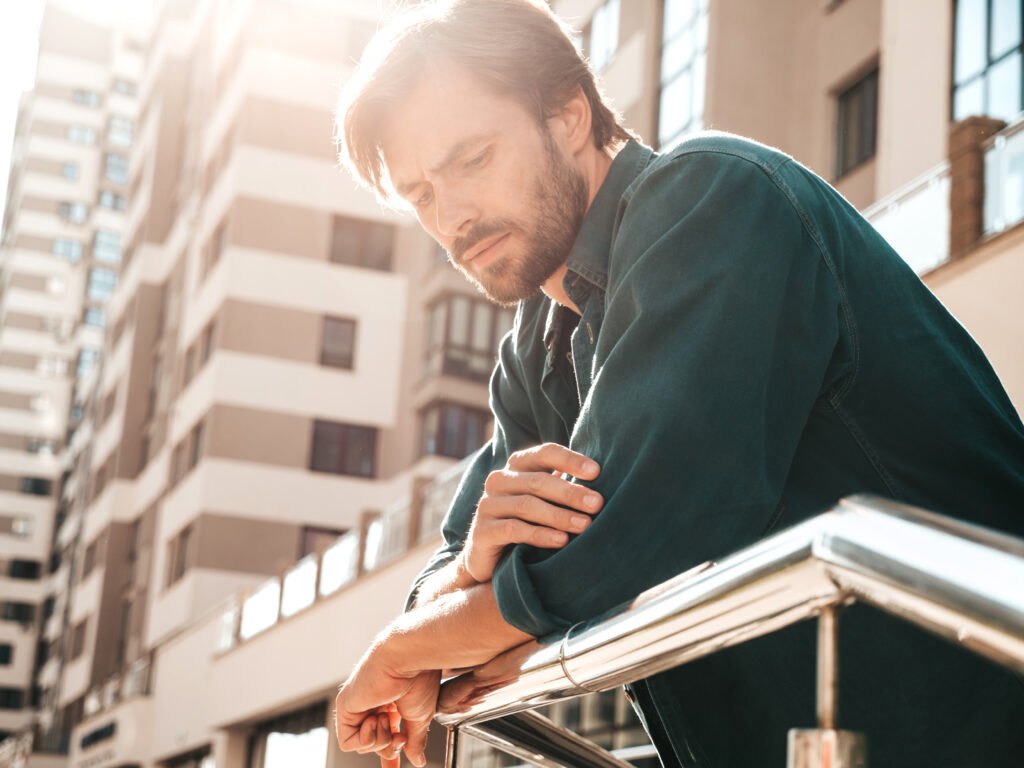 portrait of handsome man posing outdoors 2023 11 27 05 10 28 utc High-functioning addiction in men